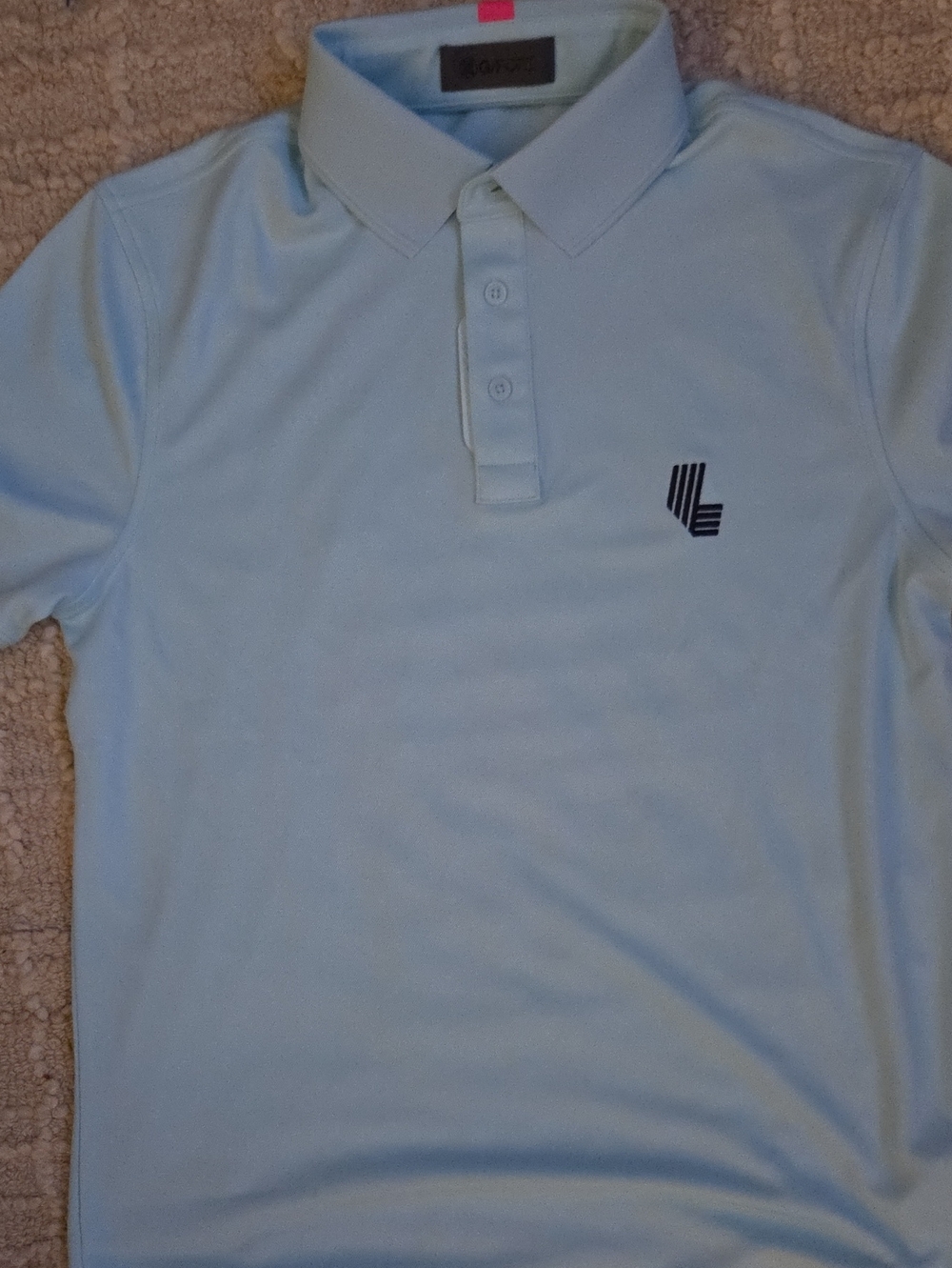 G/FORE LIV Golf League Tournament Performance Polo Ice Blue Crest